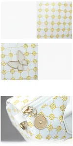 Detail of white leather pillow bag with yellow clover print and butterfly buckle