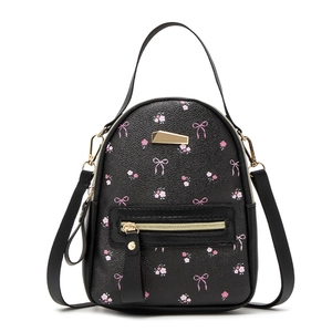 Black leather mini backpack for women featuring floral prints and gold zippers
