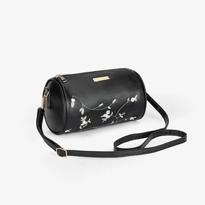 Schwarze Zylindertasche mit feiner Blumenstickerei und goldenen Metalldetails für Damen