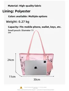 Comparaison de taille détaillée du cabas graffiti rose à côté d'une tablette