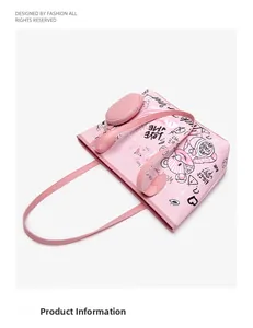 Détail du cabas rose avec motifs graffiti ours et petit porte-monnaie rond assorti