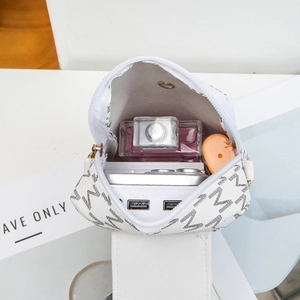 White printed mini crossbody phone bag with M-pattern and spacious interior storage