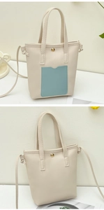 Détail d'un sac seau en cuir crème avec poche bleu clair et bandoulière réglable