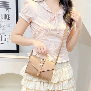 Minimalist khaki leather messenger bag for women with gold clasp and slim shoulder strap