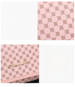 Detail of pink PU leather flap bag featuring clover print and gold logo hardware