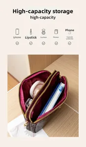 Detailed view of the triple zipper compartments showing high-capacity storage for essentials