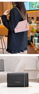 Detail view of pink and black chain cross-body bags with vintage geometric print