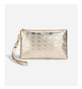 Macro shot of gold metallic quilted small pouch bag with wristlet and metal zipper detail