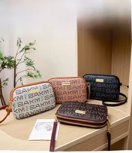 Detailed view of four colorful patterned bags with double zippers on a display shelf