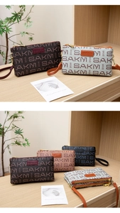 Detail of multi-compartment letter print crossbody bags with double zipper closure design