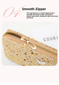 Close-up of golden sequin clutch bag featuring a metallic zipper and butterfly charm