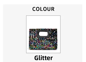 Detail of sequin evening bag featuring a unique rectangular hollow handle and color block