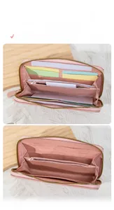 Detailed view of the multi-slot interior and zipper compartment in a pink long wallet