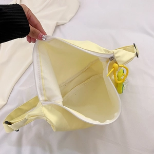 Sac à bandoulière minimaliste en toile jaune clair pour téléphone avec fermeture éclair robuste