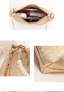 Detailansicht der goldene Stepptasche mit Perlenkette und sicherem Innenschnallenverschluss