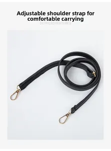 Adjustable black leather shoulder strap with gold-tone lobster clasps for handbags