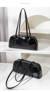 Détails du sac Boston noir brillant en cuir verni avec fermeture éclair dorée