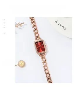 Orologio al quarzo lusso oro rosa con quadrante rosso e lunetta con zirconi incastonati