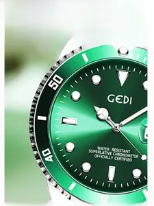 Detailed macro of the green sunray dial with date magnifier and luminous indexes