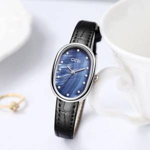 Elegant oval silver watch with blue mother-of-pearl dial and black leather strap