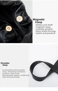 Detail of hidden magnetic buckle closure and reinforced wide shoulder strap on black bag