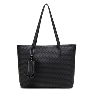 Large capacity black woven tote bag with matching pouch and golden hardware details