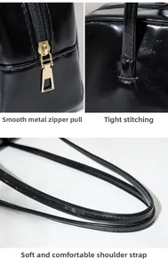 Détails de la fermeture dorée et des coutures sur un sac baguette noir brillant