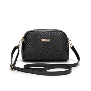Elegant black chevron quilted half-moon crossbody bag with golden hardware and zipper