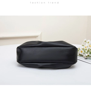 Detailed base view of the black cloud bag showing high-quality PU leather texture