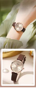 Detailed view of GEDI women's watch with brown leather strap and rose gold rhinestone dial
