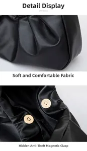 Detail of soft pleated black leather texture and secure golden magnetic snap closure