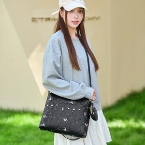 Black floral embroidered large shoulder bag with round coin purse and slim strap