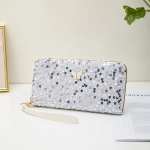 Elegant long silver sequin wallet for women featuring a delicate white butterfly ornament