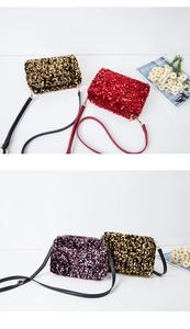 Detailed view of shimmering sequin texture on elegant red and gold crossbody evening bags
