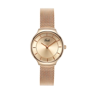 Montre élégante pour femme en or rose avec bracelet en maille milanaise et cadran