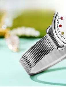 Close-up of silver Milanese mesh strap with delicate stainless steel woven texture