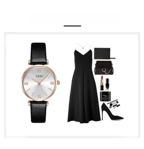Close-up of GEDI ladies' watch with black leather strap and rose gold case on a chic layout