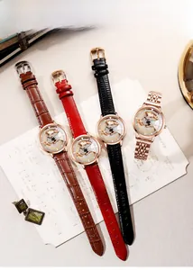 Detail of luxury women's watches with rhinestone dial and rotating leopard charm in four colors
