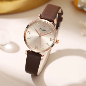 Elegant rose gold women's watch with brown leather strap and shimmering gold dial