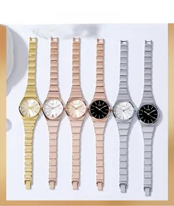 Detailed close-up of bamboo-style quartz watches in gold, silver, and rose gold finishes