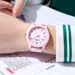 Pink waterproof silicone quartz watch for women with minimalist round analog dial