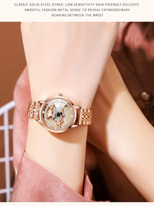 Detail of rose gold ladies watch featuring a diamond-encrusted deer motif on the dial