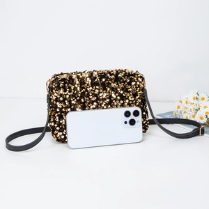 Sparkling gold sequin shoulder bag with black strap and phone for size reference