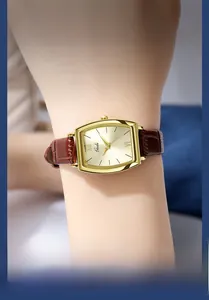 Montre à quartz rétro pour femme avec cadran doré et bracelet en cuir marron