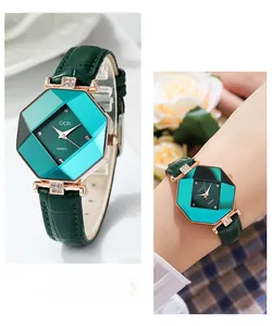 Detail of octagonal quartz watch with emerald green dial and rhinestone accents