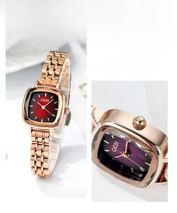 Detail view of square rose gold stainless steel watch band and minimalist gradient dial