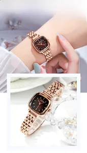 Detail of GEDI rose gold square quartz watch with chocolate dial and metal strap