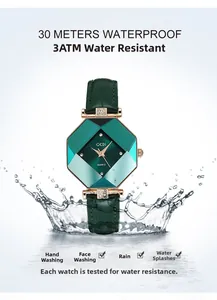 Close-up of GEDI octagon watch with green dial and water splashes for 3ATM waterproof detail