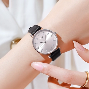 GEDI luxury women's quartz watch with black leather strap and rhinestone silver dial