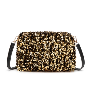 Sparkling gold and black sequin crossbody bag with adjustable black shoulder strap